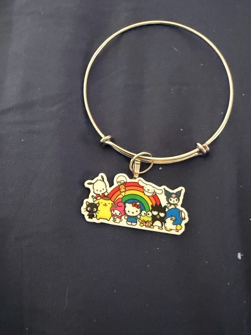 Gold-tone Hello Kitty Rainbow Charm Bangle Bracelet